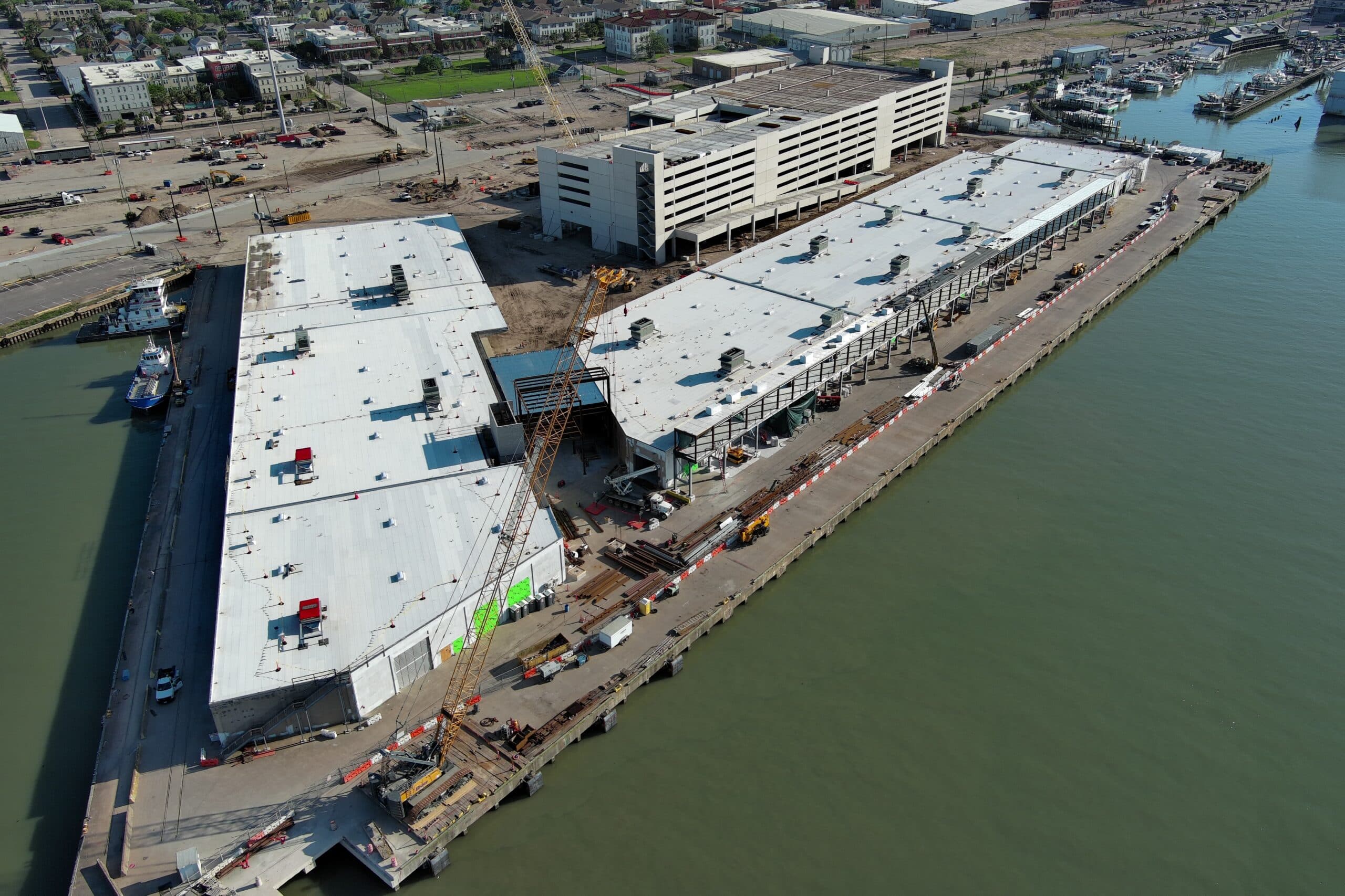 Aerial view of a cruise terminal under construction.