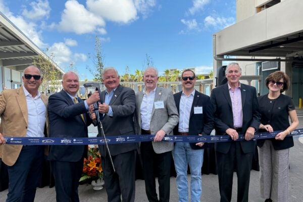 Ribbon cutting for Cruise Terminal 16, Galveston Wharves Board of Directors gather to cut the ribbon